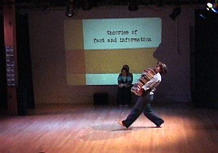 Taryn Griggs dances with books in Works on Paper in BAX First Weekends